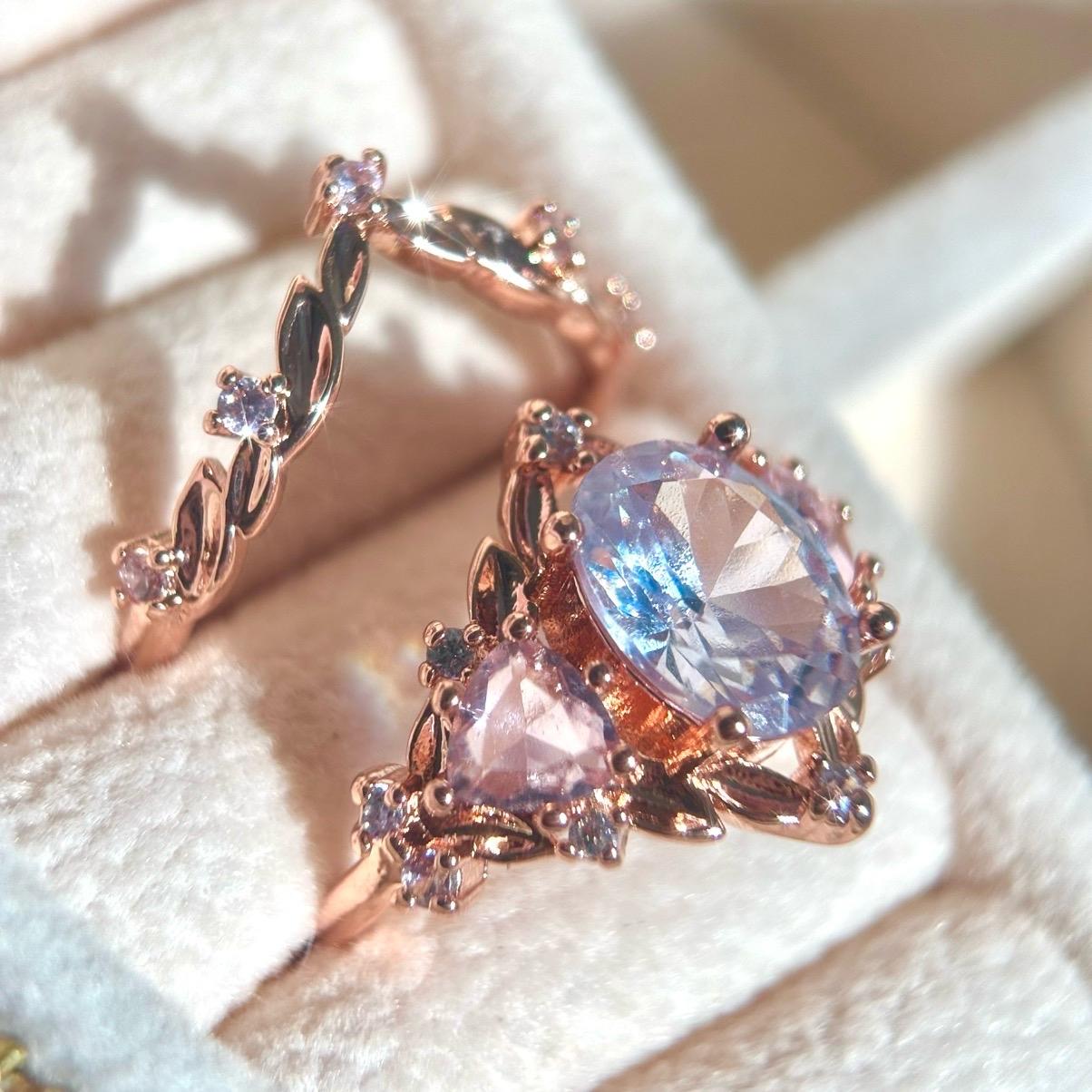 Pink zircon fairy ring set with blue and pink multi gemstone accents