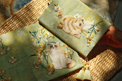 Handmade STAR WISH garden cat embroidered journal with floral designs and lined pages for writing or sketching.