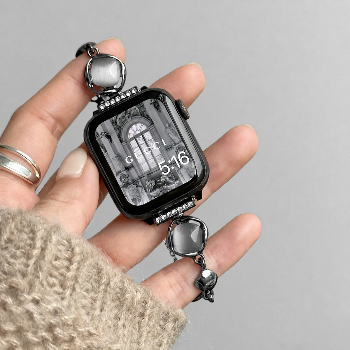 Gunmetal sculpted shell Apple Watch band detail