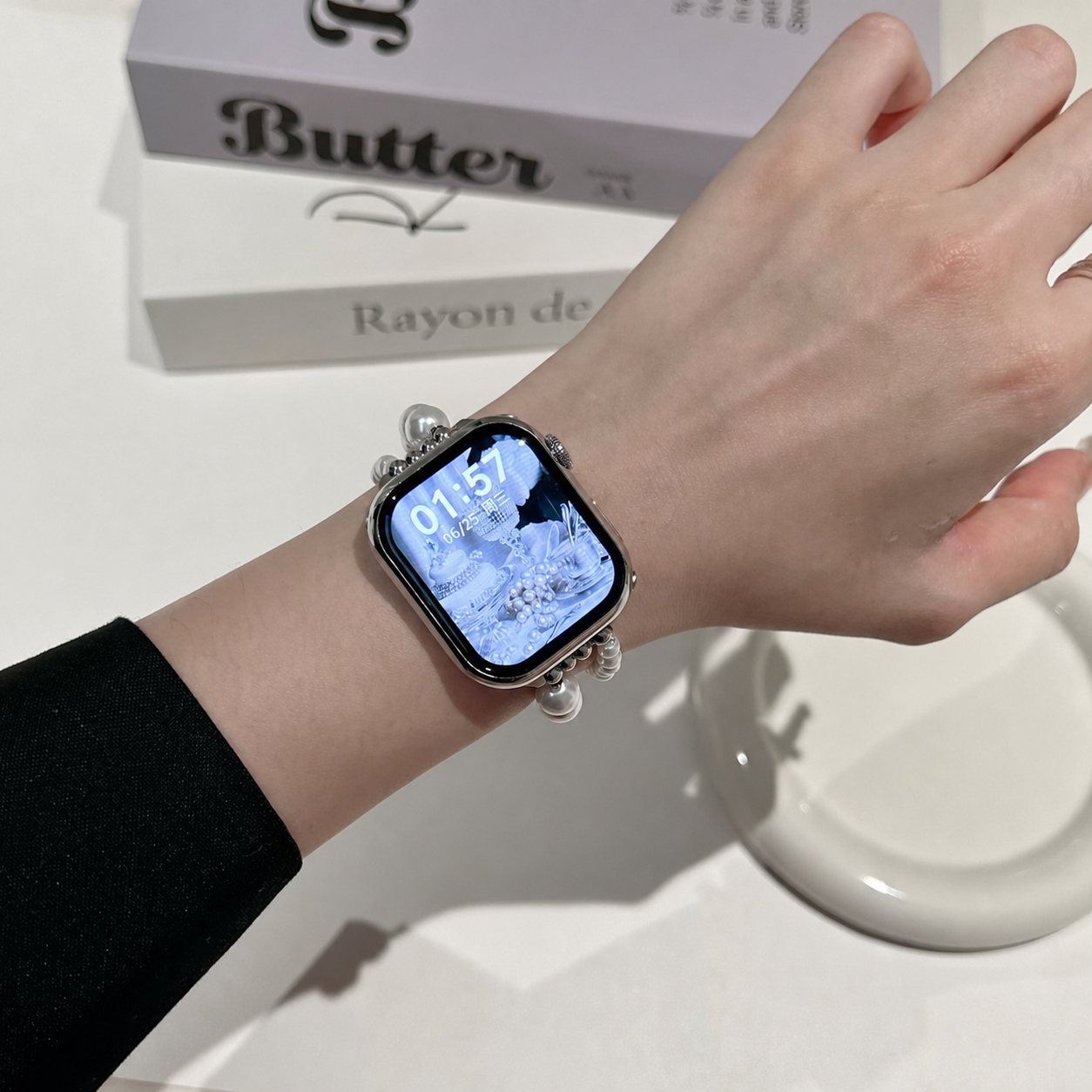 Pearl aquamarine Apple Watch band on wrist