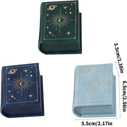 Three celestial book-style jewelry boxes with moon and stars design and measurements
