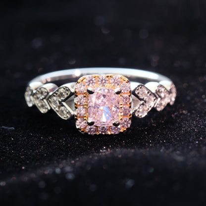 Pink square zircon sterling silver ring with 925 hallmark, featuring a modern design and sparkling gemstone setting.