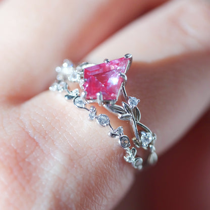 Purple alexandrite ring sets in leaf design on finger