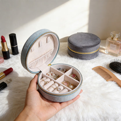 STAR WISH round velvet travel jewelry case organizer with compartments for rings, necklaces, and earrings on a white background.