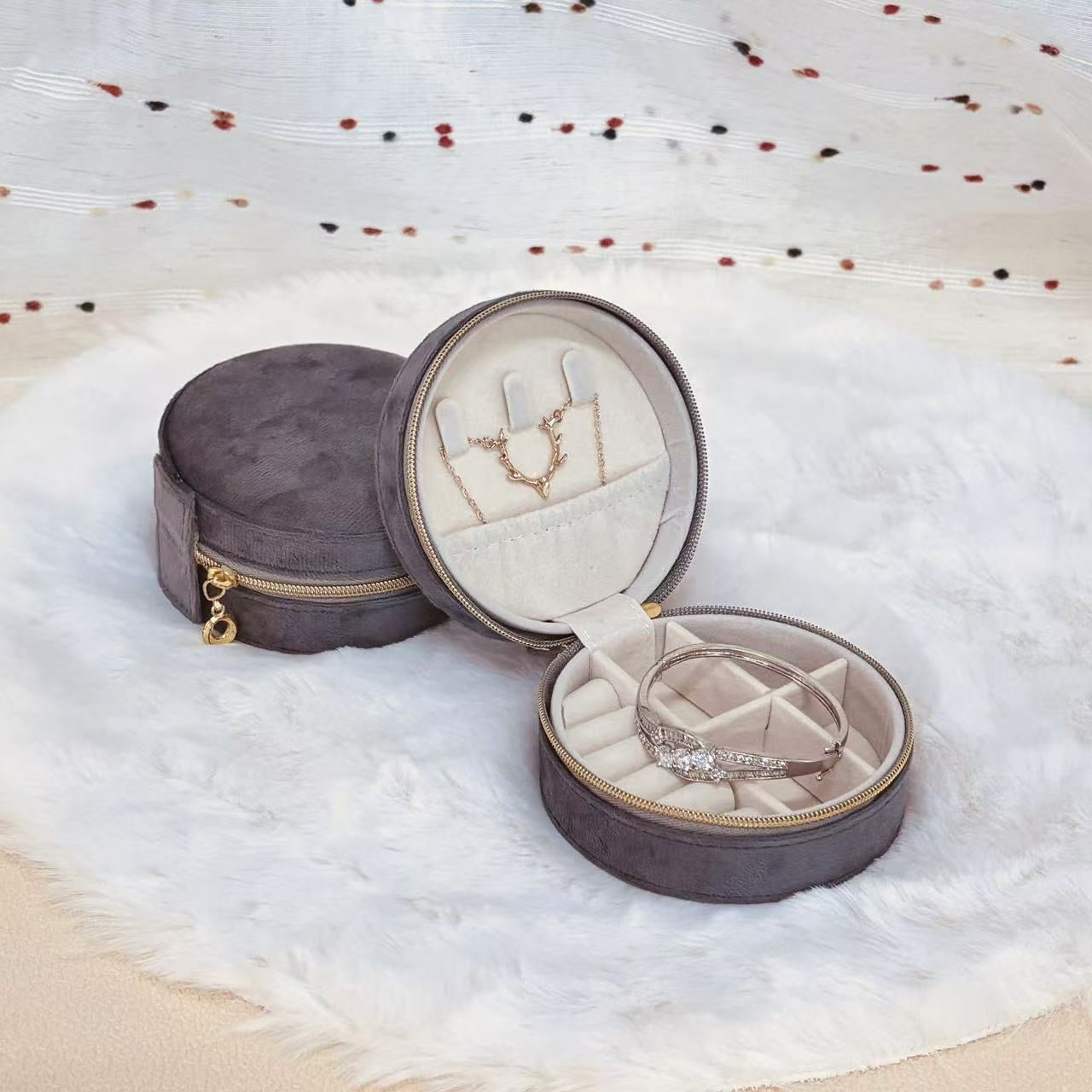 Round velvet travel jewelry case organizer by STAR WISH with compartments for rings, necklaces, and earrings.