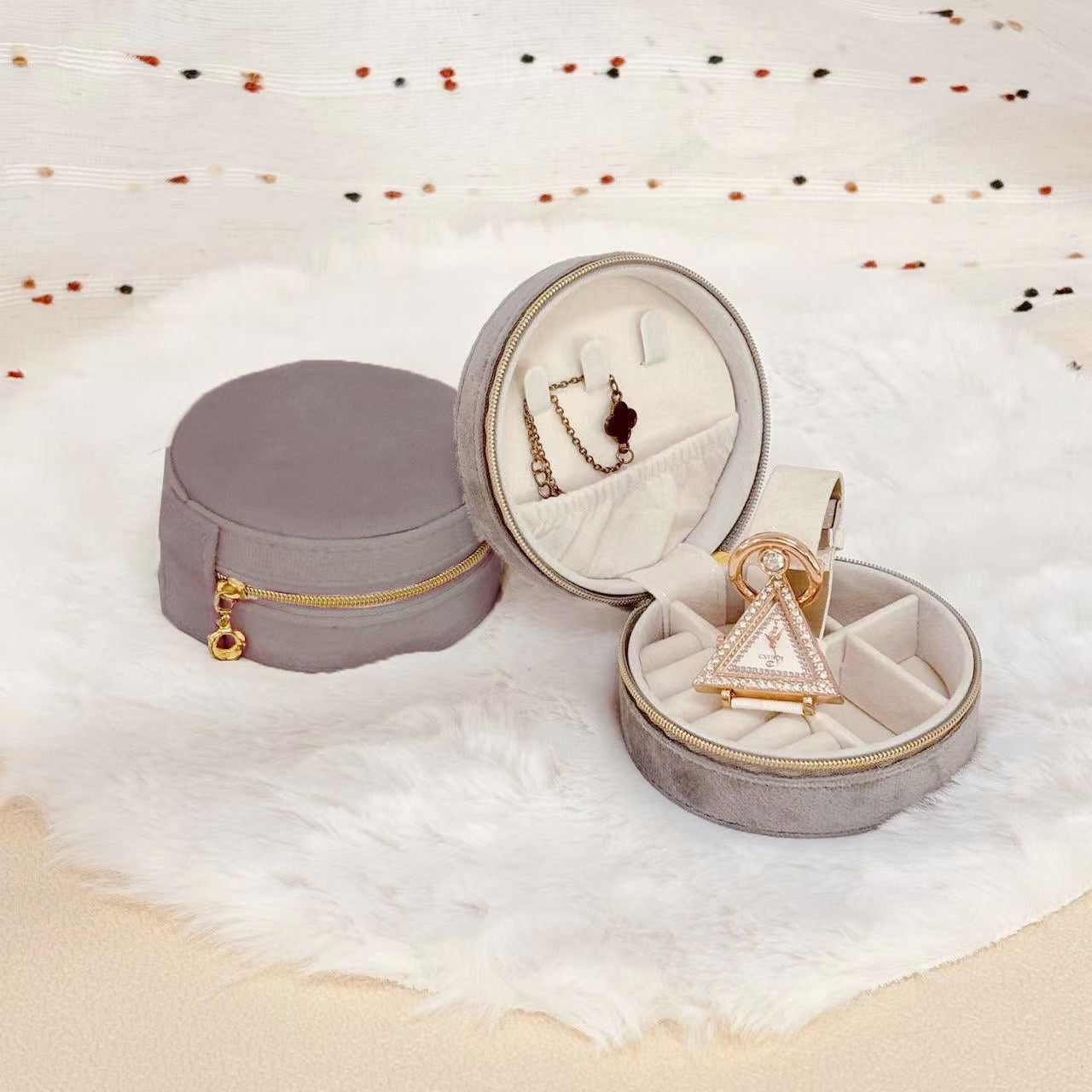 Round velvet travel jewelry case organizer by STAR WISH with compartments for necklaces, rings, and earrings.