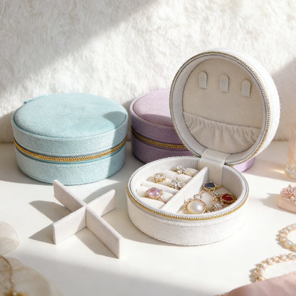 Round velvet travel jewelry case organizer by STAR WISH with compartments for necklaces, rings, and earrings.