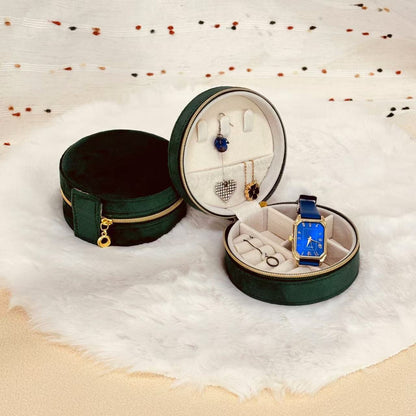 Round velvet travel jewelry case organizer by STAR WISH with compartments for necklaces, rings, and earrings.