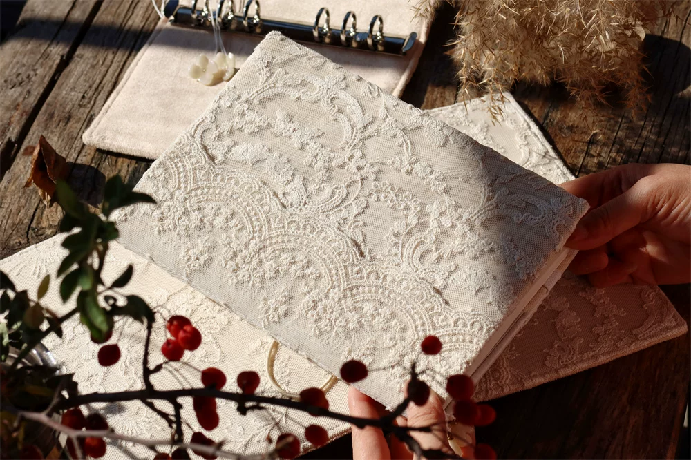 Handmade blooming garden lace journal by STAR WISH with floral lace cover and lined pages for writing and note-taking.
