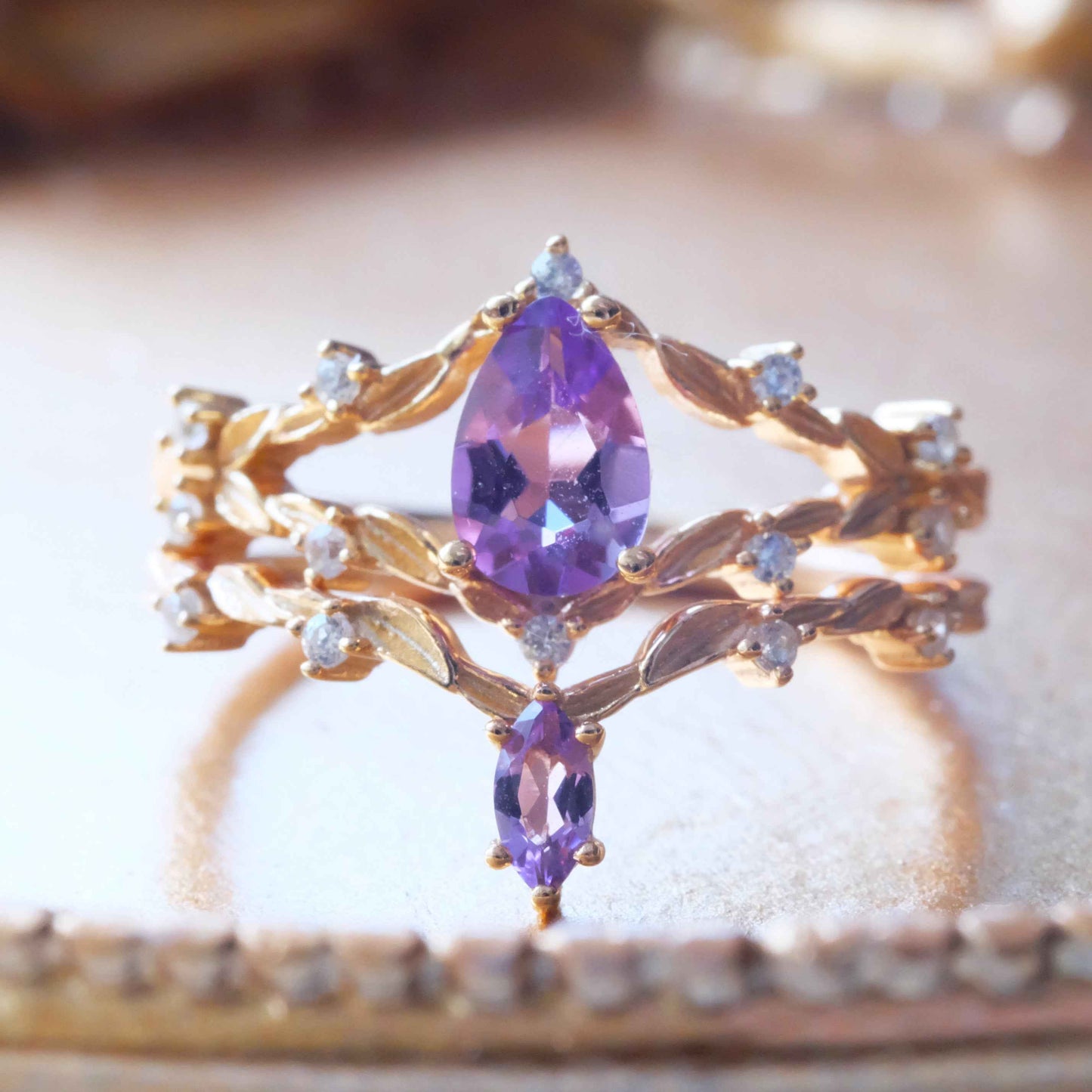 Side view of STAR WISH purple amethyst double layer ring set