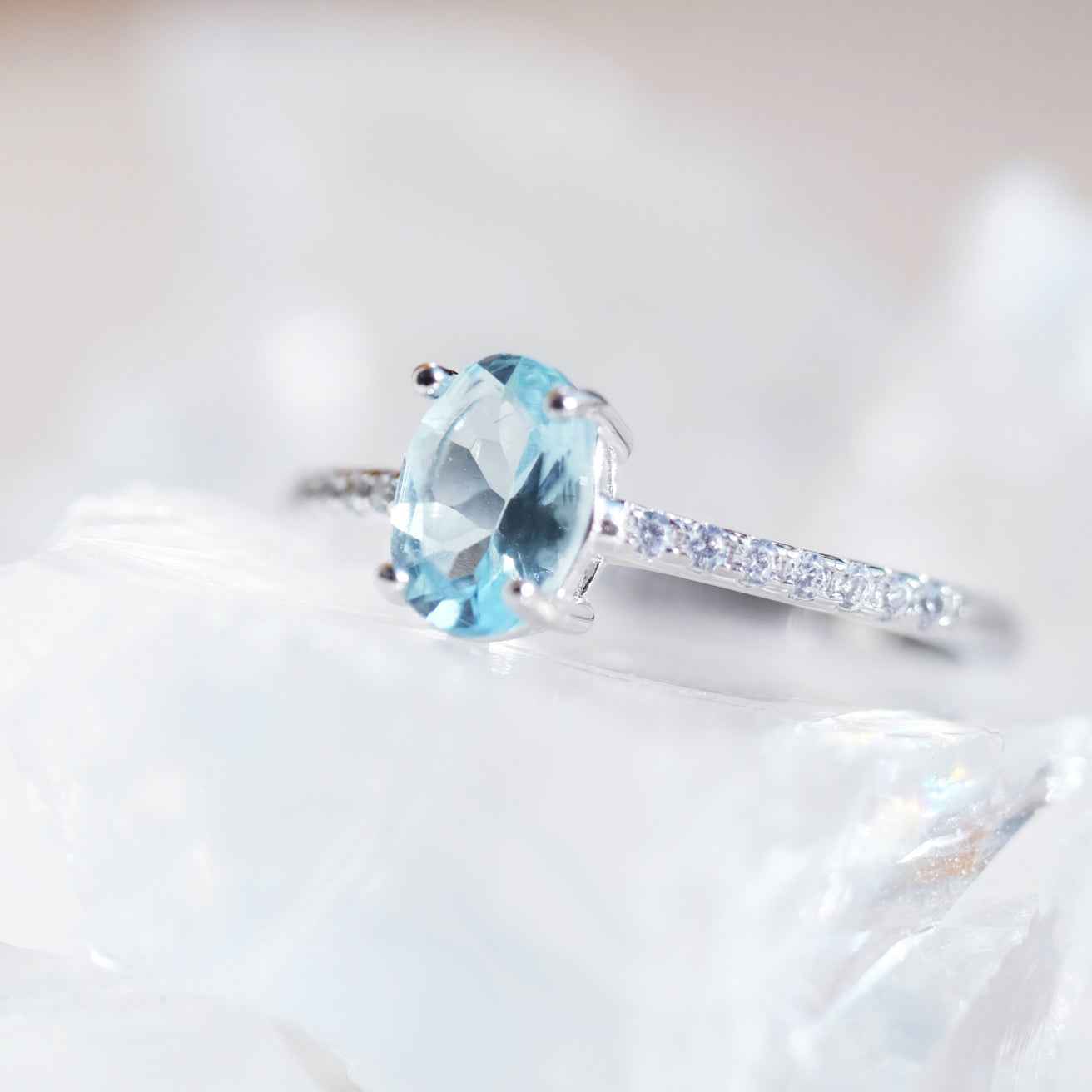 Side view of STAR WISH aquamarine adjustable ring in sterling silver