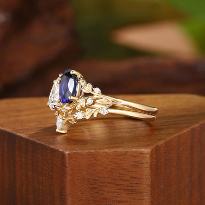 Blue sapphire and moissanite floral branch ring set side profile
