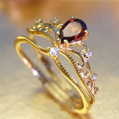 Side view of STAR WISH garnet crown adjustable ring in sterling silver