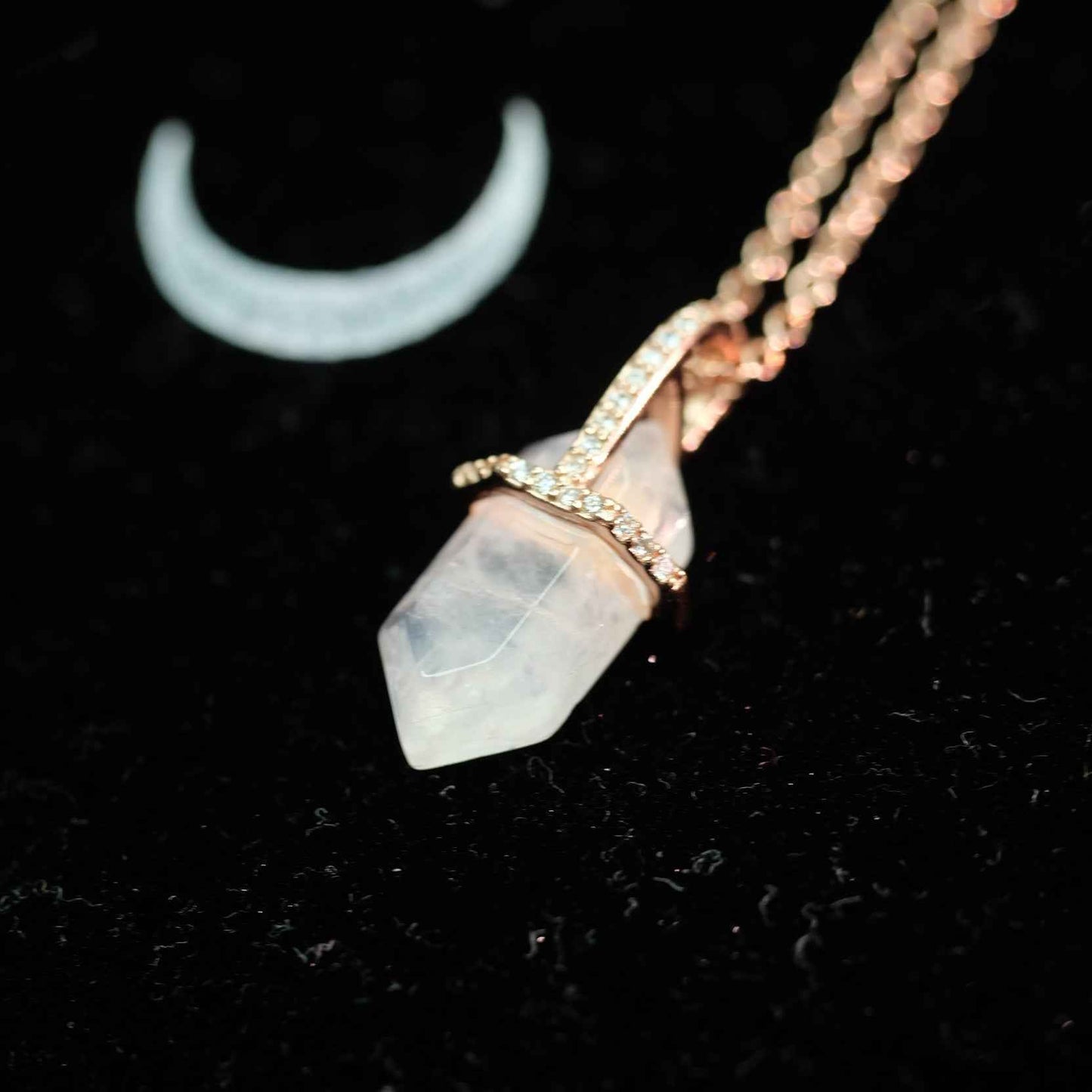 STAR WISH hexagon moonstone sterling silver necklace shown in hand photo