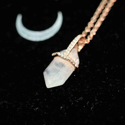 STAR WISH hexagon moonstone sterling silver necklace shown in hand photo