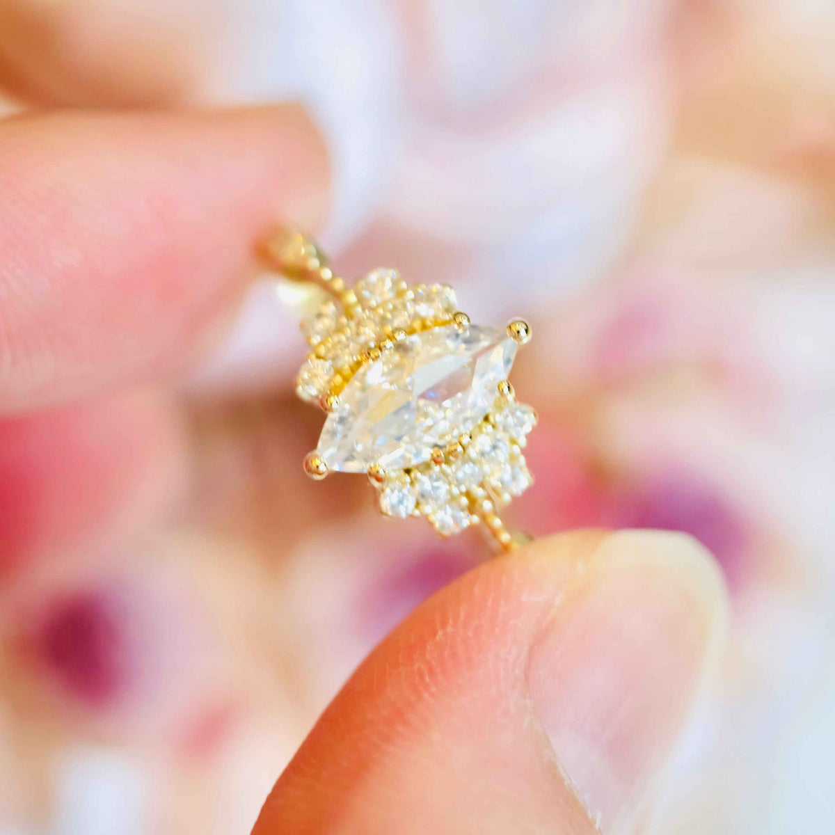 Angled view of marquise ring highlighting gemstone setting