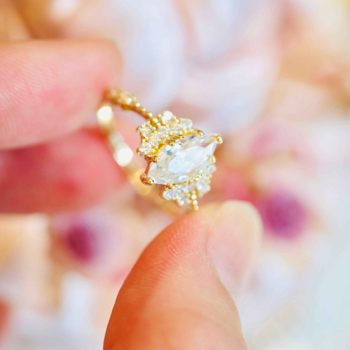 Close up of STAR WISH marquise ring and pointed gemstone cut