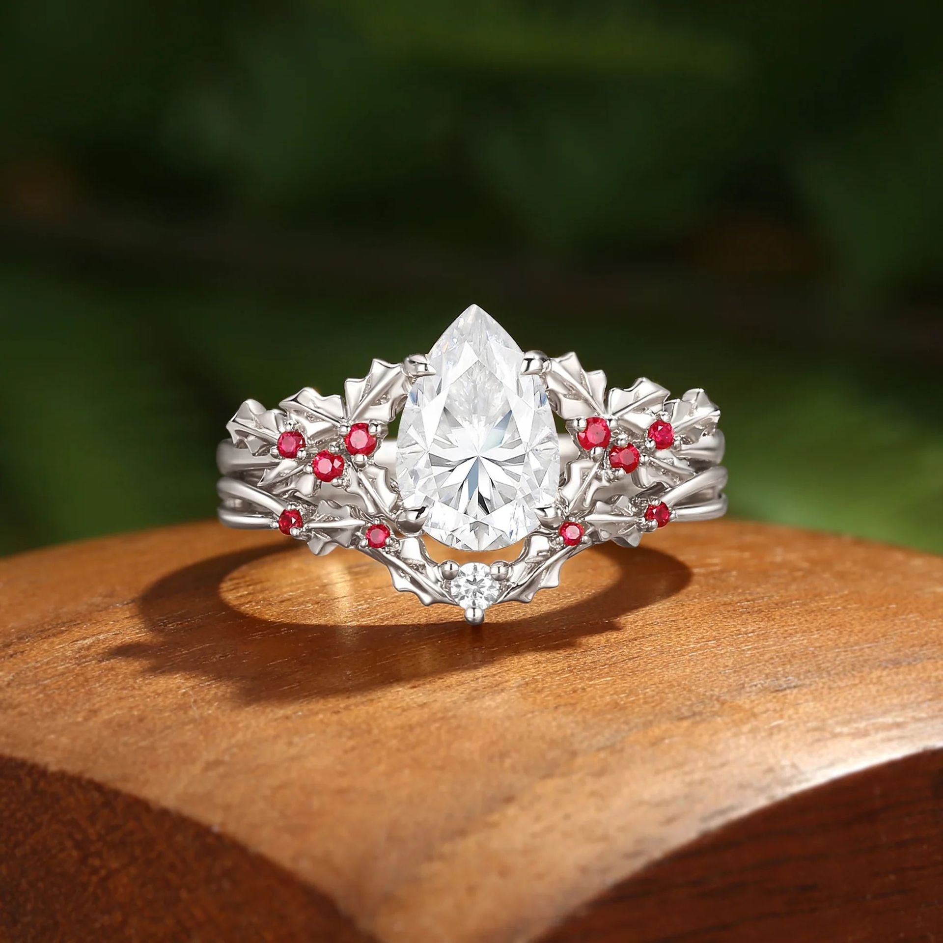 Pear-cut moissanite leaf ring set in silver-tone finish