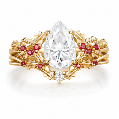Handmade pear-cut moissanite leaf stacking ring set on white background