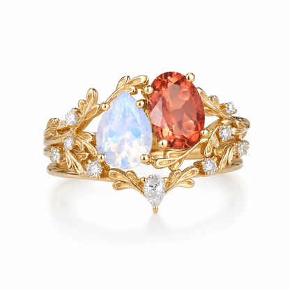 STAR WISH moonstone and spessartine floral branch ring set on white background
