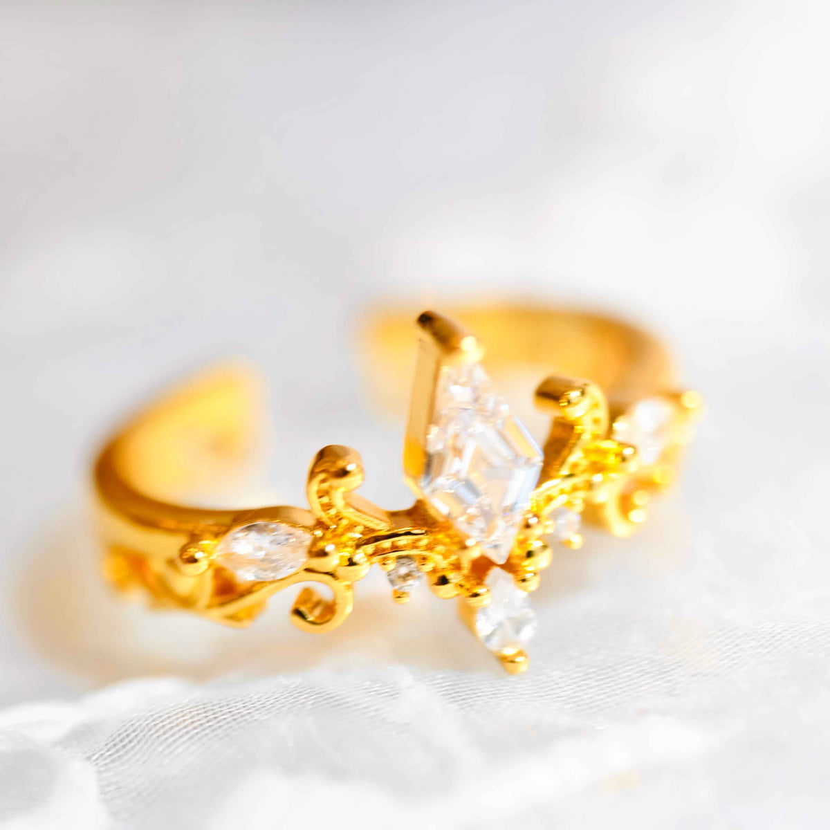 Side view of STAR WISH rhombus zircon crown ring with silver band