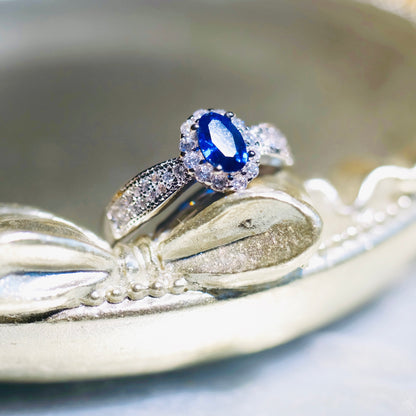 Side view of STAR WISH oval sapphire adjustable ring