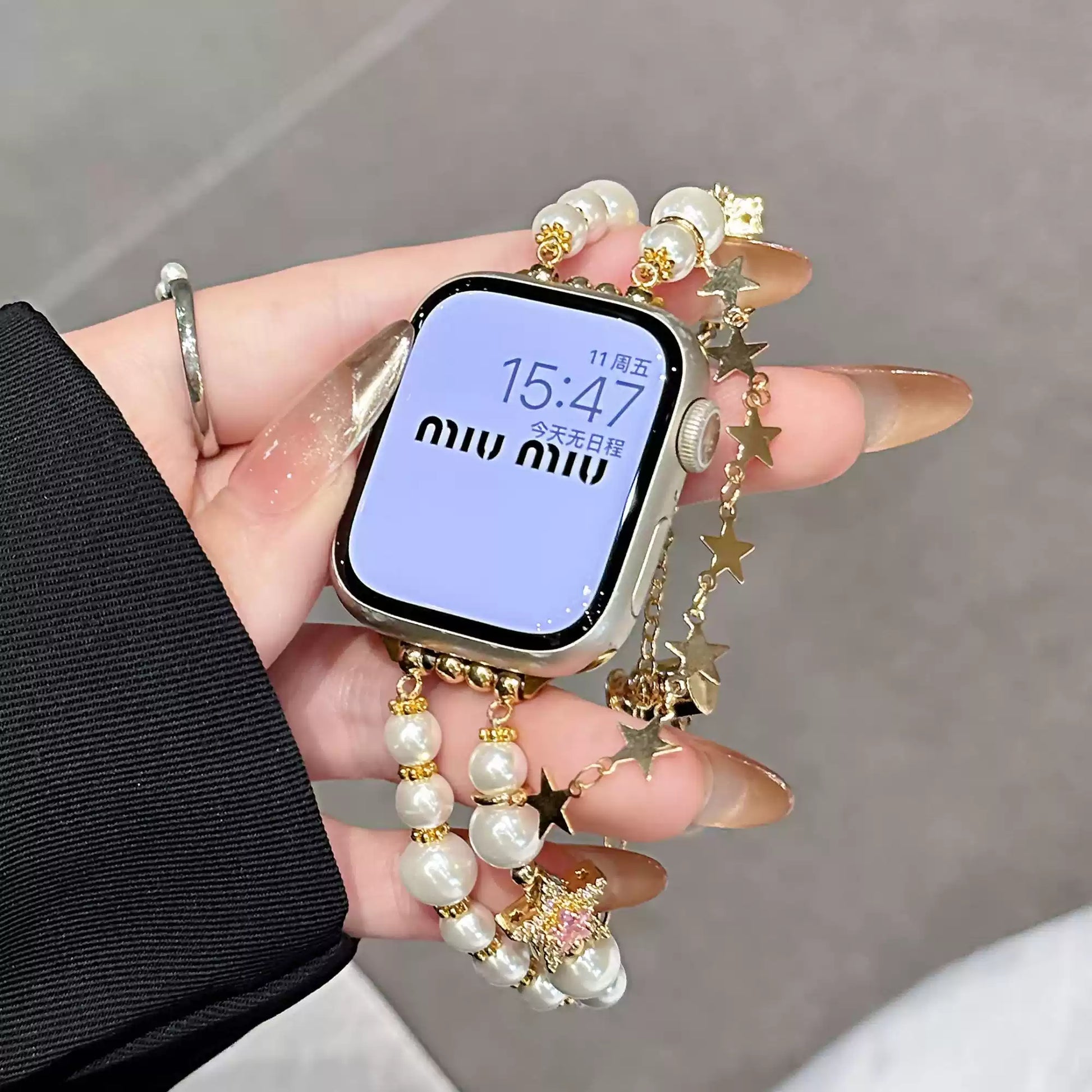 Gold pearl charm Apple Watch band detail