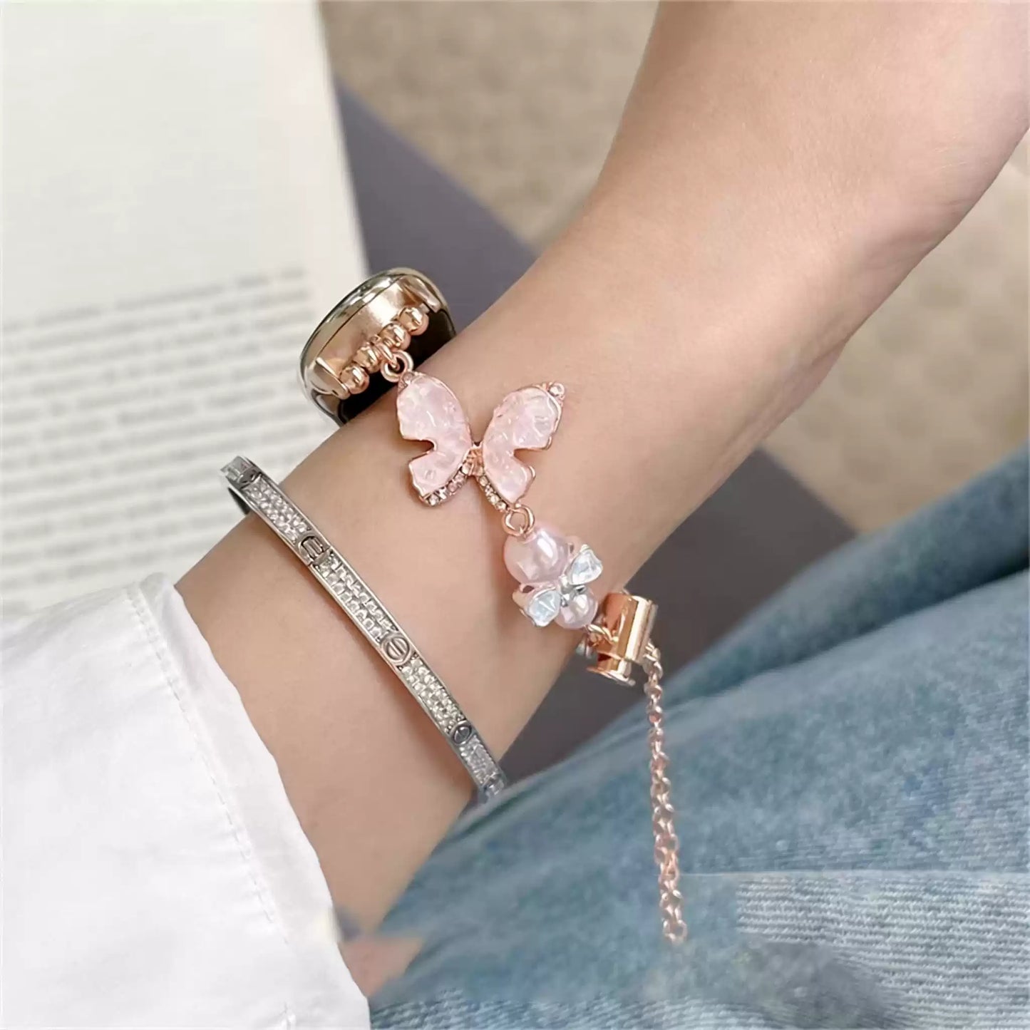 Pink crystal bow Apple Watch band wrist detail