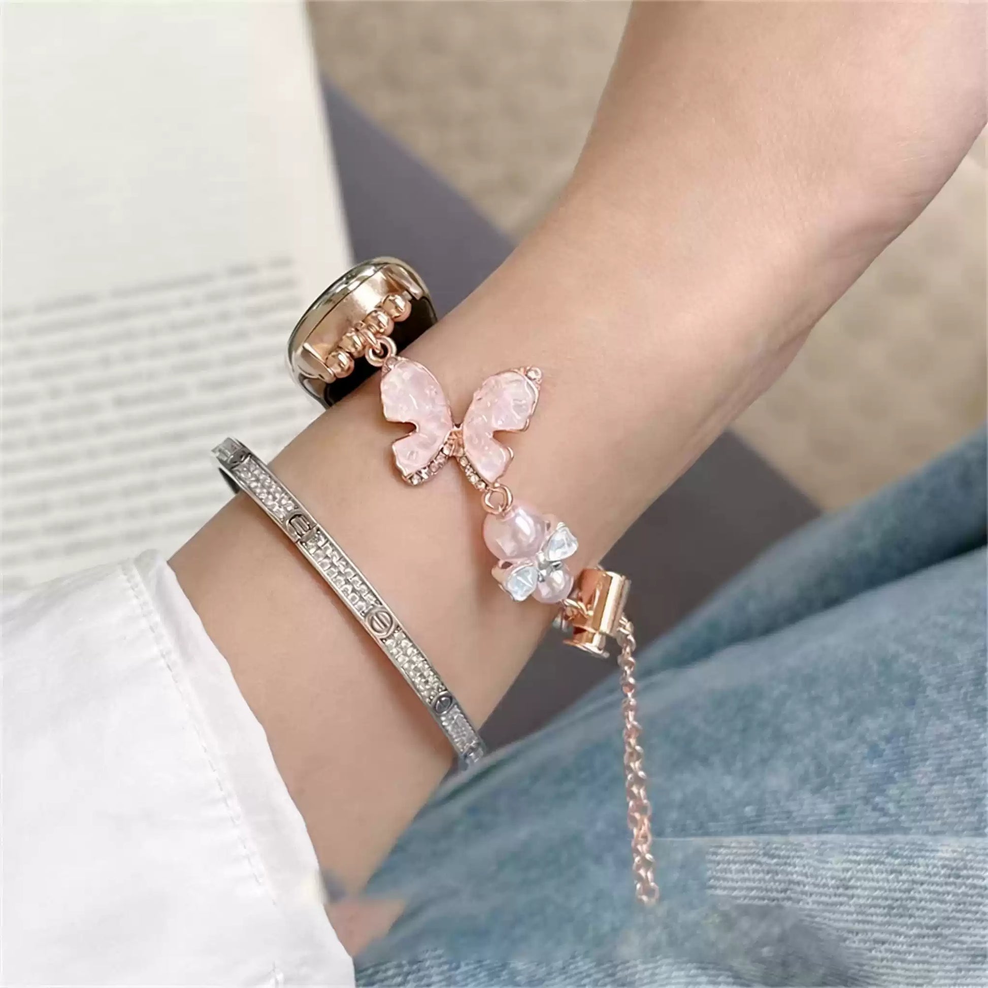 Pink crystal bow Apple Watch band wrist detail