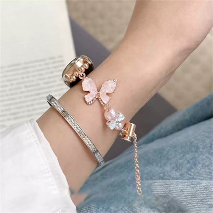 Pink crystal bow Apple Watch band wrist detail