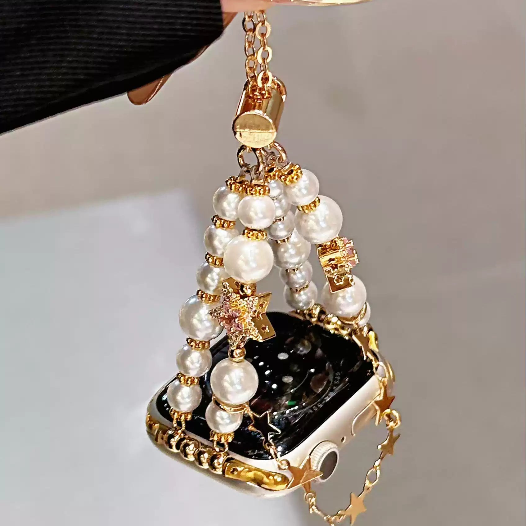 Pearl charm Apple Watch band jewelry detail
