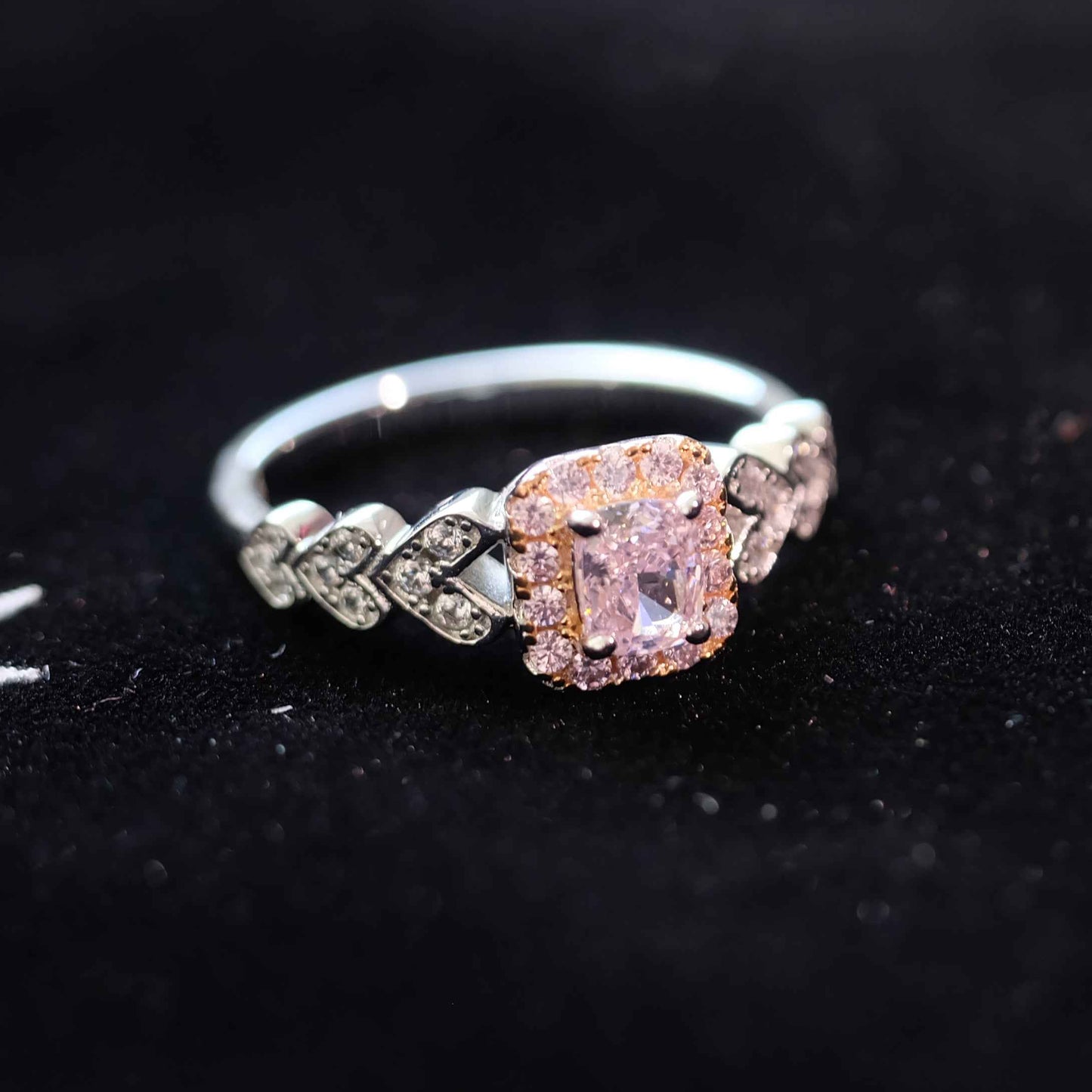 Close up of square pink zircon gemstone ring in sterling silver