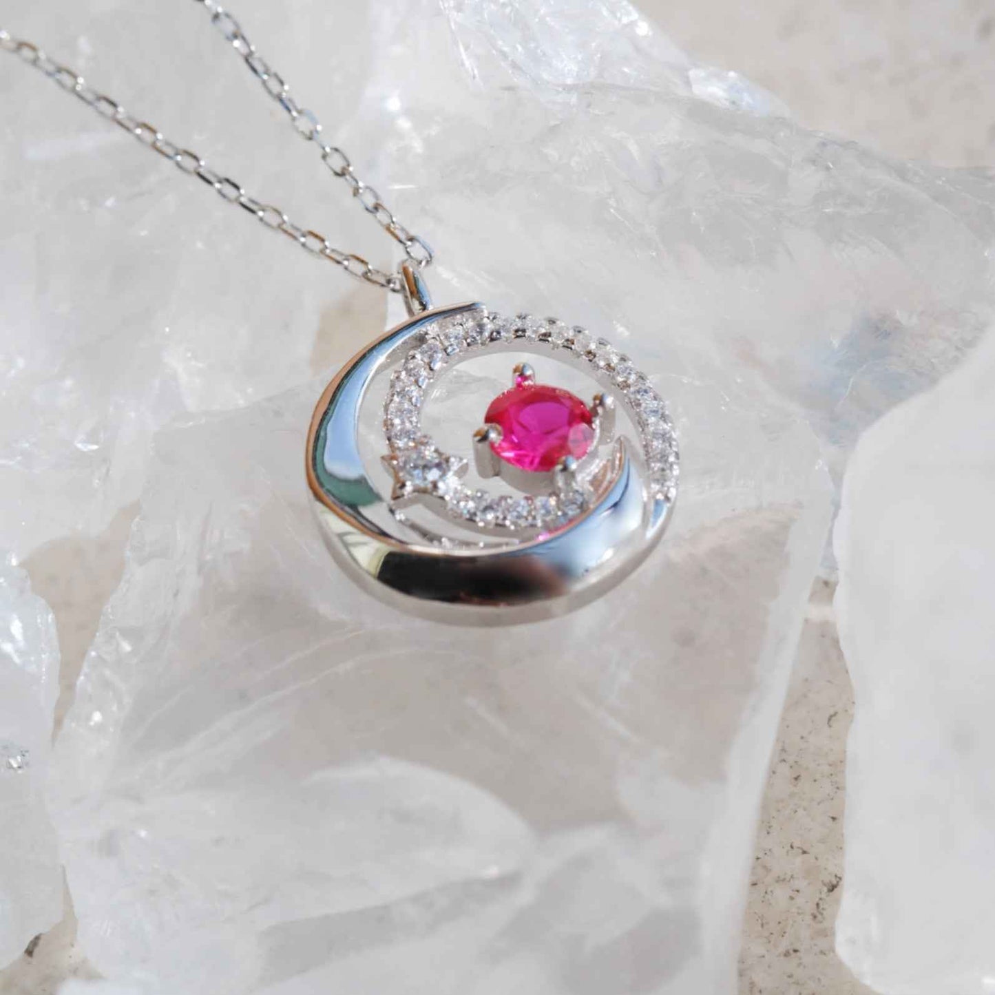 Detail view of STAR WISH sterling silver moon and star necklace
