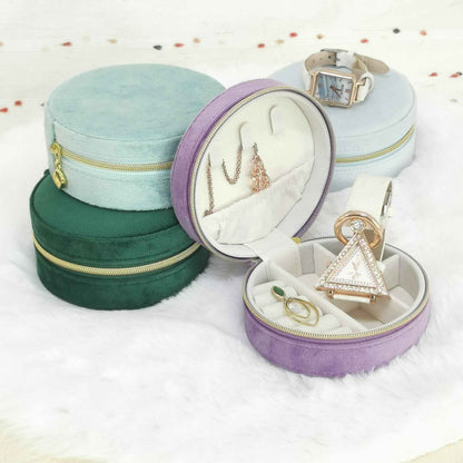 Side view of compact velvet travel jewelry case