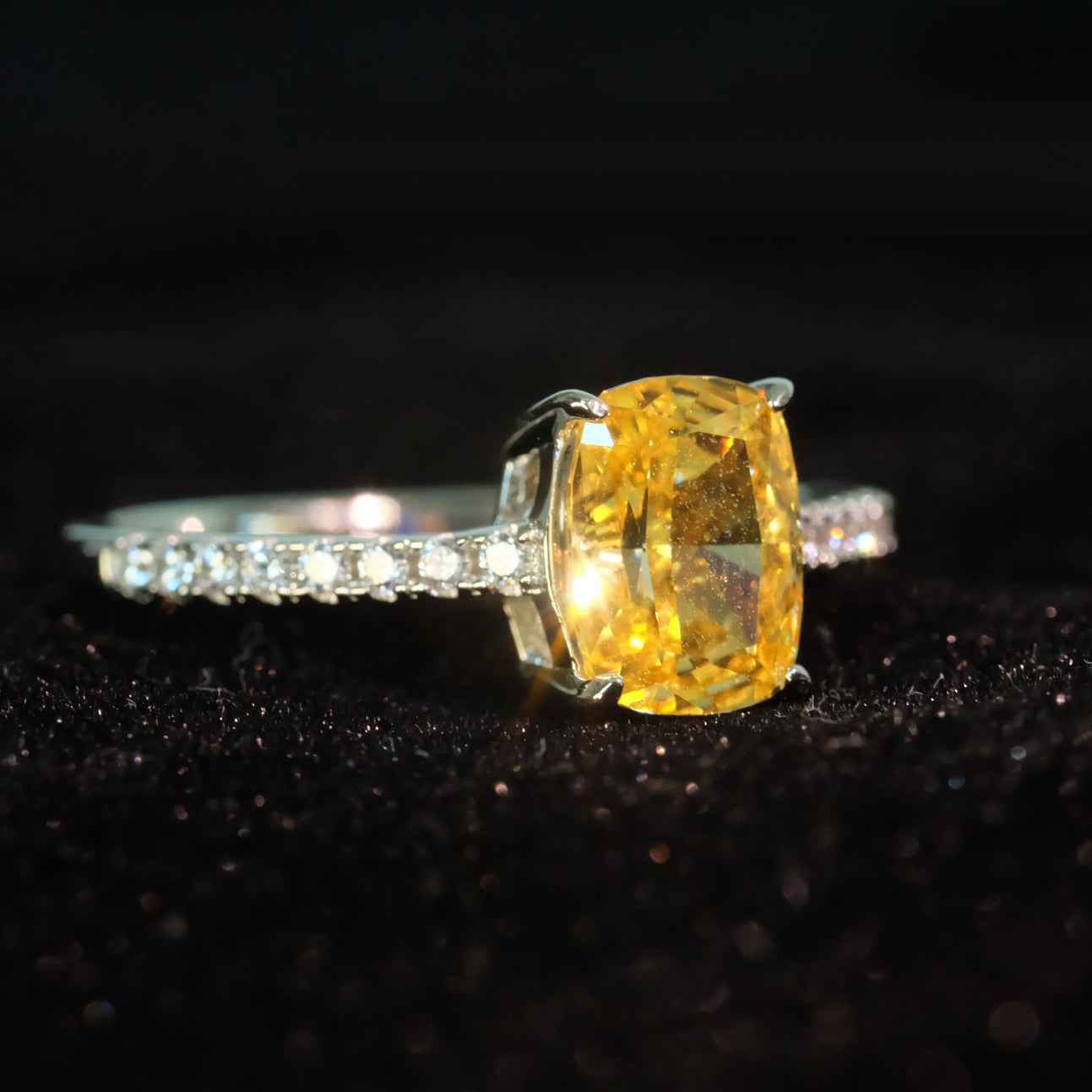 Side view of yellow roses yellow zircon ring